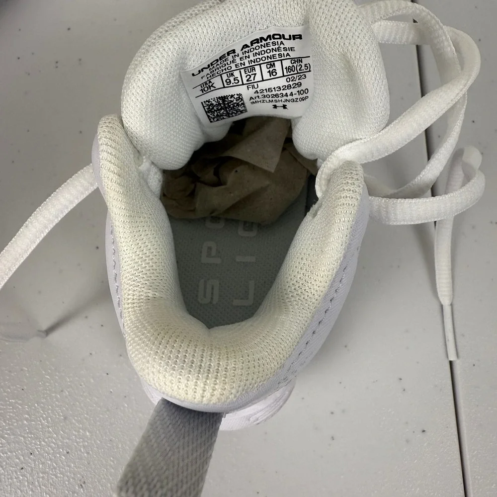 Under Armour White Kids Cleat Sneakers with Silver Logo